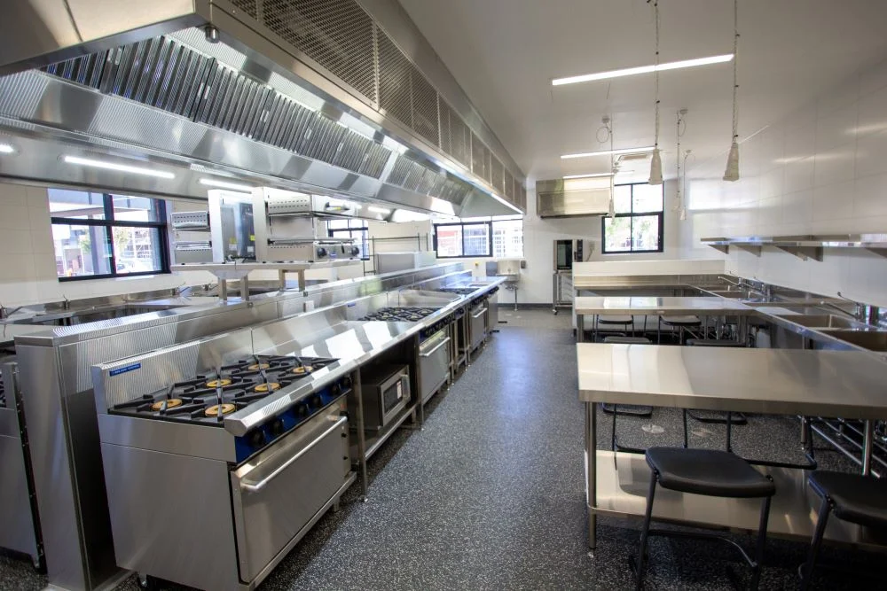 College food technology classroom fitout with student cooking bays and custom joinery