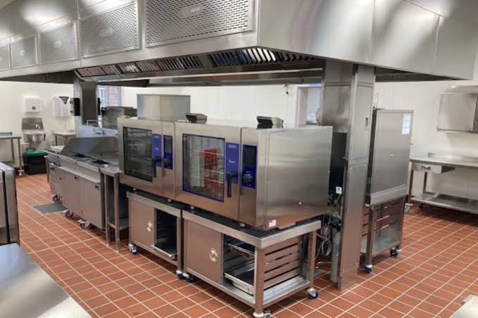 Government facility commercial kitchen with stainless steel cook line